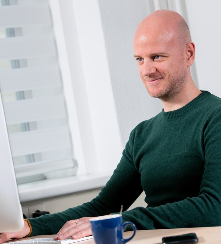 developer niek achter het scherm